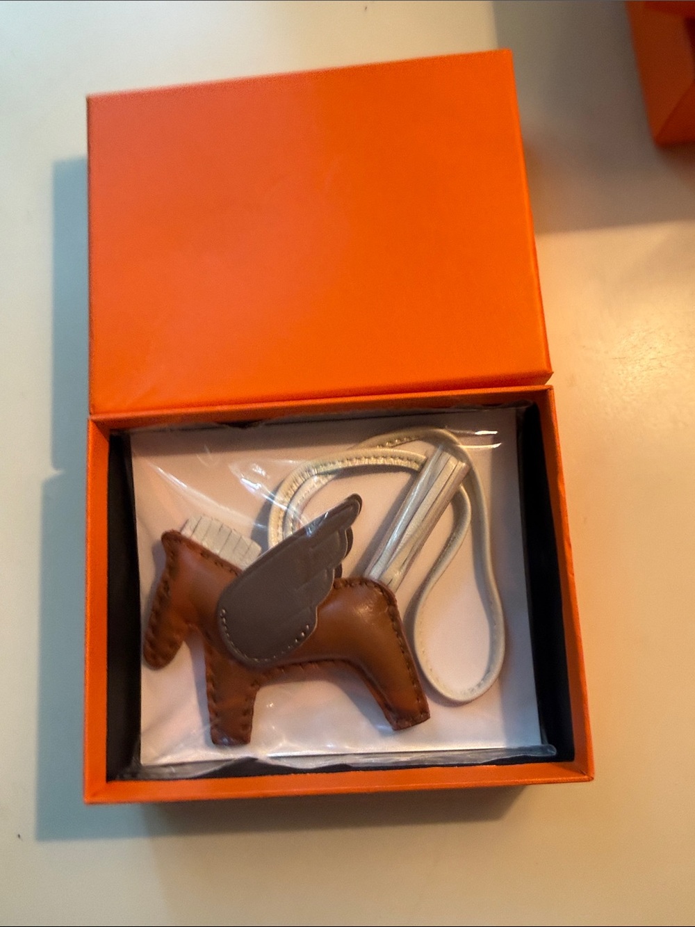 Hermès Brown Leather Horse Bag Charm with Gray Wing